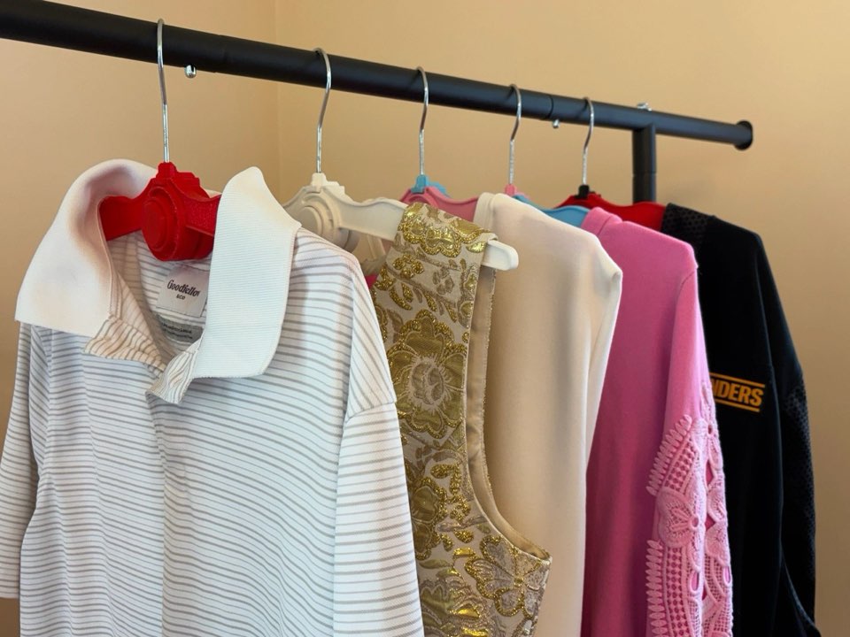 Quick Hanger holding multiple garments